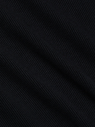 Close-up of the Brynlee Scoopneck Tee in black, crafted from stretch cotton ribbed fabric with diagonal textured lines that form a subtle striped pattern and offer a soft, slightly glossy finish.