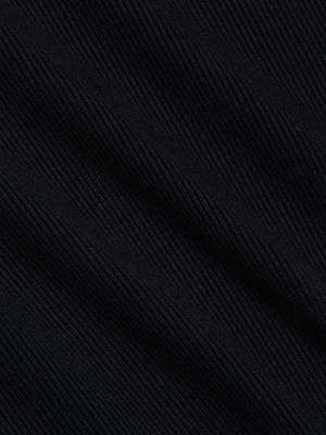Close-up of black ribbed fabric on the L'AGENCE Brynlee Scoopneck Tee, showing textured ridges and diagonal lines for a subtle pattern.