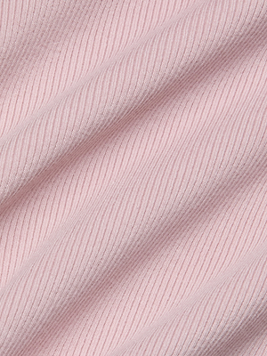 Close-up of the Brynlee Scoopneck Tee in light pink stretch cotton ribbed fabric, showing diagonal folds and fine lines that highlight its soft texture and signature ribbed look.