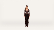 A woman wearing sunglasses, a long-sleeve top, black pants, and boots stands facing forward against a plain white background.