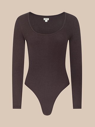 The Elara Scoopneck Bodysuit is a long-sleeve, dark brown ribbed stretch cotton piece featuring a scoop neckline, perfect for layering and shown against a beige background.