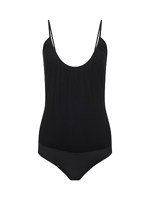 The L'AGENCE Naseem Ruched Bodysuit in black features adjustable shoulder straps and a low scoop neckline, made from stretch jersey, shown against a plain white background.