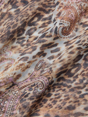 Close-up of semi-sheer fabric with a leopard paisley print in brown, beige, and black, featuring a textured, slightly wrinkled surface—ideal for the Kalea Mesh Bodysuit.