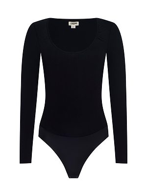 The Cassandra Ruched Bodysuit is a black, long-sleeve, fitted top with a scoop neckline—perfect as a sleek base layer. Displayed against a plain white background.