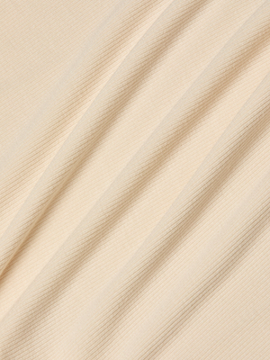 Close-up of ultra soft ribbed fabric with subtle diagonal folds, creating soft shadows and texture—perfect for the Cael Tank Top as an elevated basic or layering piece.