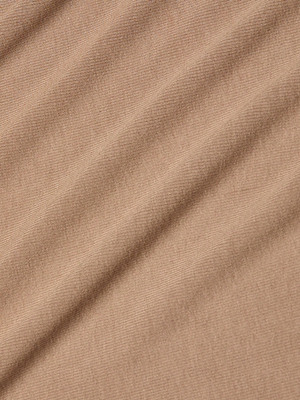 Close-up of light brown, soft stretch rib fabric with gentle folds and a smooth texture—ideal as a base layer or for making the Vanya Scoopneck Top.