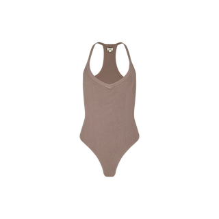The Wrenna Racerback Bodysuit is a taupe, sleeveless tank crafted from rib fabric, featuring a V-neckline and racerback design, displayed on a plain white background.