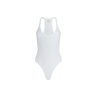 The Wrenna Racerback Bodysuit is a white sleeveless one-piece featuring a scoop neckline and racerback design, crafted from soft rib fabric for textured comfort—resembling a fitted tank bodysuit—shown against a plain white background.