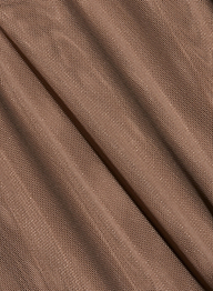 Close-up of the Thalassa High-Leg Bodysuit, featuring light brown mesh fabric with a fine, net-like texture and diagonal folds that create shadowed lines across the surface, evoking chic French style.