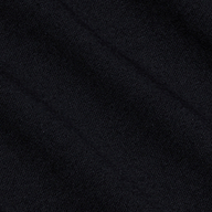 Close-up of a black textured fabric with subtle diagonal lines and shadows, displaying fine woven fibers and a soft surface pattern—crafted from luxurious Supima cotton, as featured in the Brianna Cotton V-Neck Tee.