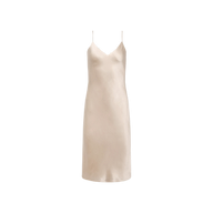The Jodie Silk Slip Dress is a sleeveless, champagne-colored charmeuse design featuring thin spaghetti straps, a V-neckline, and a straight silhouette, shown against a plain white background.