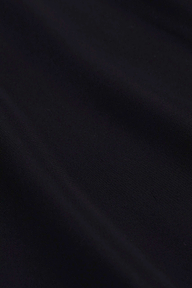 A close-up of the Akiya Satin Maxi Dress in black, highlighting its textured satin fabric and subtle diagonal folds.