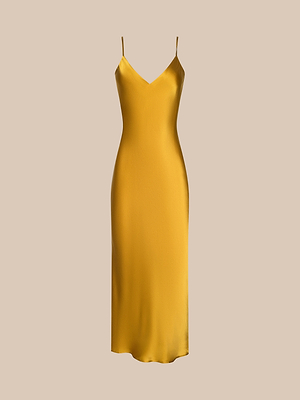 The Seridie Silk Slip Dress is a sleeveless, gold satin silk slip with spaghetti straps and a V-neckline, bias-cut for a flattering silhouette, shown against a plain beige background.