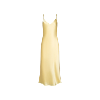 The Seridie Silk Slip Dress, shown against a plain white background, features a light yellow bias-cut design with thin spaghetti straps, a V-neckline, and a midi-length hem.