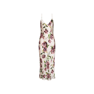 The Seridie Silk Slip Dress is a sleeveless, ankle-length slip dress with thin straps, crafted from silk. It features a white base adorned with a print of large purple and pink roses accented by green leaves.