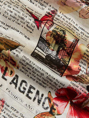 A close-up of the Seridie Silk Slip Dress shows silk charmeuse printed with newspaper text, a black-and-white cityscape, red and orange flowers, and the bold word LAGENCE—blending text, art, and floral motifs.