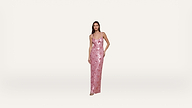 A woman stands against a plain background wearing a long, pink, sleeveless sequin dress with thin straps and an elegant, fitted silhouette.