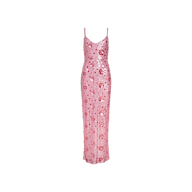 The Karma Sequin Maxi Dress is a long, sleeveless pink dress adorned with sequins and a floral pattern throughout. Featuring thin spaghetti straps and a fitted silhouette, it’s perfect for standout occasions.
