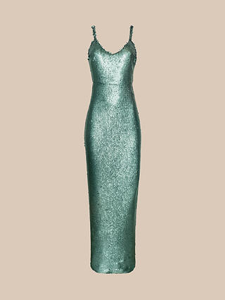 The Karma Sequin Maxi Dress is a sleeveless, floor-length gown adorned with matte teal sequins in a silver-green hue. It features a structured bodice, thin straps, and a V-neckline, and is displayed against a plain beige background.