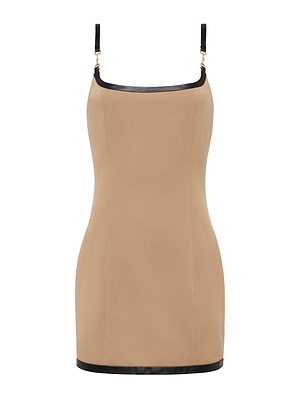 The Jettie Mini Dress by L'AGENCE is a sleeveless, fitted beige minidress with thin black straps and vegan leather trim at the neckline and hem. Its smooth texture creates a simple, elegant, and modern yet timeless look.