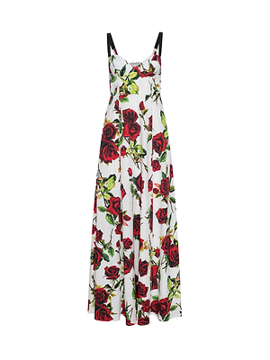 The Sutton Beaded Strap Gown is a sleeveless, floor-length maxi dress with black beaded adjustable straps, featuring a striking red rose and green leaf pattern.
