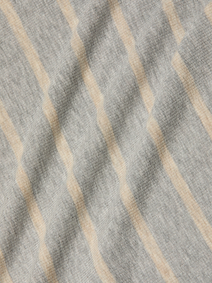 A close-up of the Ellis Tank Dress in gray stretch rib fabric with soft beige horizontal stripes, highlighting its slightly wrinkled, textured surface—perfect for a comfy, casual style.