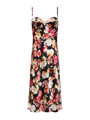 The Solay Silk Slip Dress by L'AGENCE is a sleeveless, knee-length slip with thin straps and a vibrant rose print in red, pink, white, and yellow on a black background.
