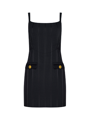The Helen Mini Dress by L’AGENCE is a sleeveless, fitted black mini dress made from Italian suiting fabric, featuring thin straps, two front flap pockets, and gold buttons, shown on a plain white background.