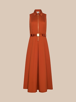 Sleeveless burnt orange Kolton Dress featuring a collared neckline, front zipper, and matching belt with gold buckle—ideal for desk-to-drinks—displayed against a neutral beige background.