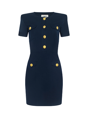 The Cori Mini Dress is a navy blue, short-sleeve mini dress with a structured fit, gold-tone button hardware, and four pockets (two on the chest and two on the hips), shown against a plain white background.