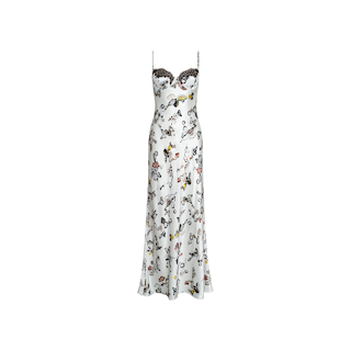 Sayla Silk Gown: A white satin slip dress featuring a black lace-trimmed sweetheart neckline, slender straps, and a long silhouette. This event-ready gown is adorned with a colorful, playful pattern of illustrated figures and objects.