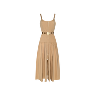 The Rima Maxi Dress is a sleeveless neutral tan piece in a maxi length, featuring a front zipper, gold metallic belt, and gathered skirt. Crafted from comfortable stretch poplin with thin shoulder straps and a subtly flared hem, the dress is shown against a plain white background.