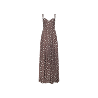 The Rosette Maxi Dress is a brown sleeveless maxi dress with white polka dots, crafted from lightweight viscose. It features a fitted bodice with a sweetheart neckline and a long, pleated skirt, shown here against a plain white background.