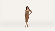A woman stands against a plain white background, wearing a fitted, long-sleeve, brown midi dress and beige heels, with one hand on her hip.