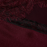 Elsa Silk Gown in burgundy silk, featuring a slip silhouette and black scalloped lace accents.