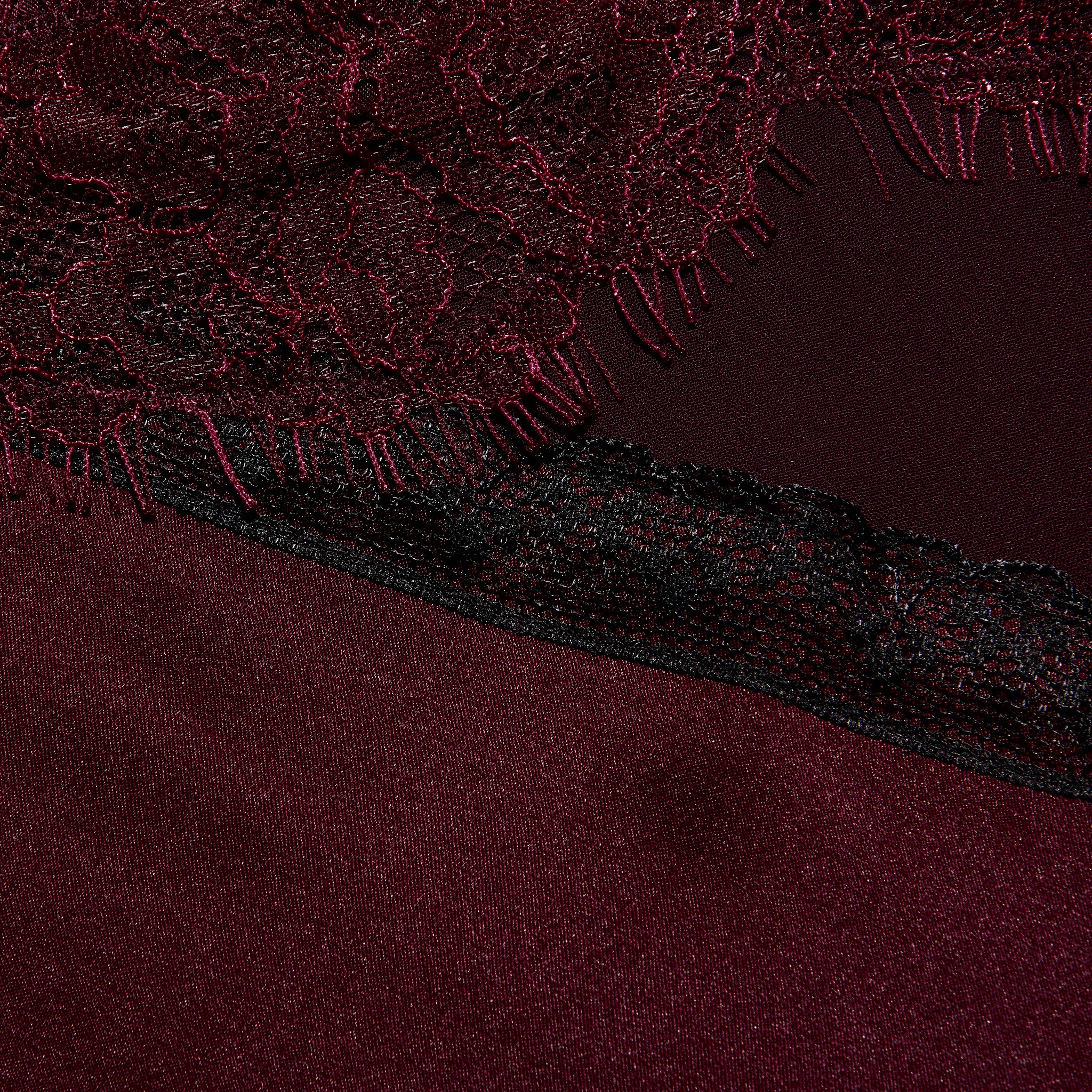 Elsa Silk Gown in burgundy silk, featuring a slip silhouette and black scalloped lace accents.