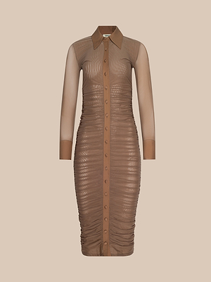 The Adriana Ruched Midi Dress is a brown, button-down, knee-length dress with sheer mesh long sleeves, a poplin collar neckline, and ruched detailing on the front and sides, shown against a plain beige background.