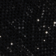 Close-up of the Paula Gown’s black sequin fabric, featuring small, round, shiny sequins that reflect light and create sparkling highlights on a dark textured background—perfect for adding a touch of glamour to sheer mesh eveningwear or pairing with sequin rhinestone embellishments.