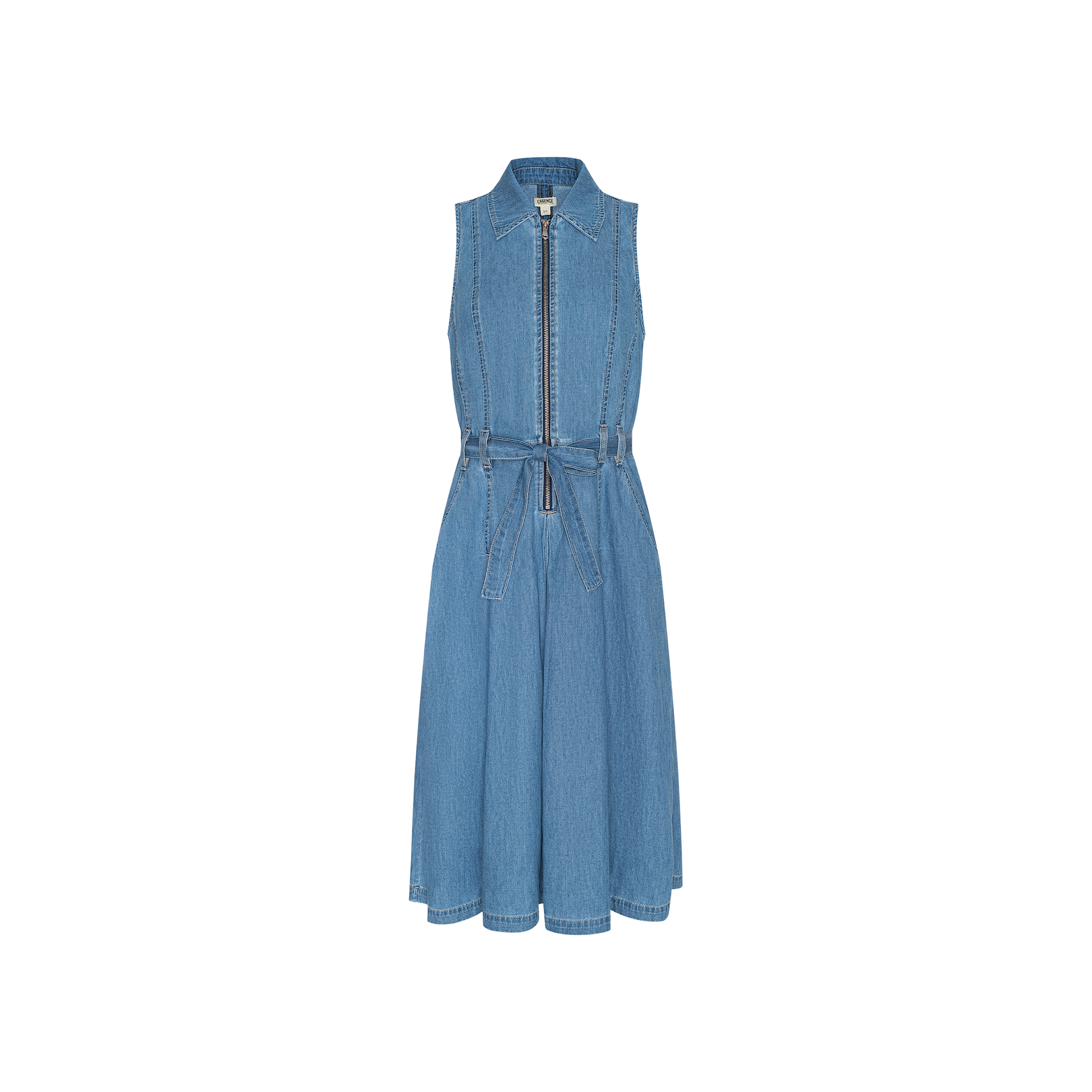 The Kieran Shirt Dress is a sleeveless blue denim design featuring a front zipper, collared neckline, and a matching tie belt at the waist. Crafted from featherweight denim, its knee-length A-line skirt adds effortless style for any occasion.
