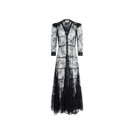 The Seraphina Lace Tiered Maxi Dress is a long-sleeved, floor-length black dress crafted from sheer lace. It features a deep V-neckline, a fitted waist, and intricate floral lace detailing throughout. The dress is designed with tiered layers and a flowing, semi-sheer skirt, all beautifully displayed against a plain white background.