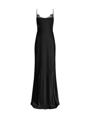 Black slip dress with lace detailing on straps against a white background