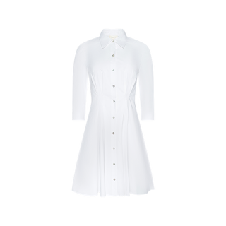 The Journi Shirt Dress is a white, collared button-down shirt dress with three-quarter sleeves and a fitted waist, crafted from cotton-blend poplin and displayed on a plain white background. This piece features a timeless silhouette that makes it a versatile wardrobe staple.