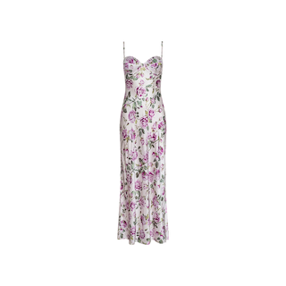 The Sayla Silk Gown is a sleeveless, ankle-length dress crafted from silk, featuring delicate spaghetti straps and a fitted bodice. Its white fabric is adorned with a pink and green rose and leaf pattern, bringing vintage glamour to the design.