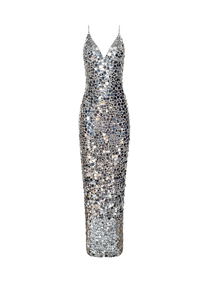 The Caelith Sequin Gown is a sleeveless, floor-length silver dress featuring a deep V-neckline, thin spaghetti straps, and large reflective sequins—embodying the glamour of Fall 2026 at New York Fashion Week.