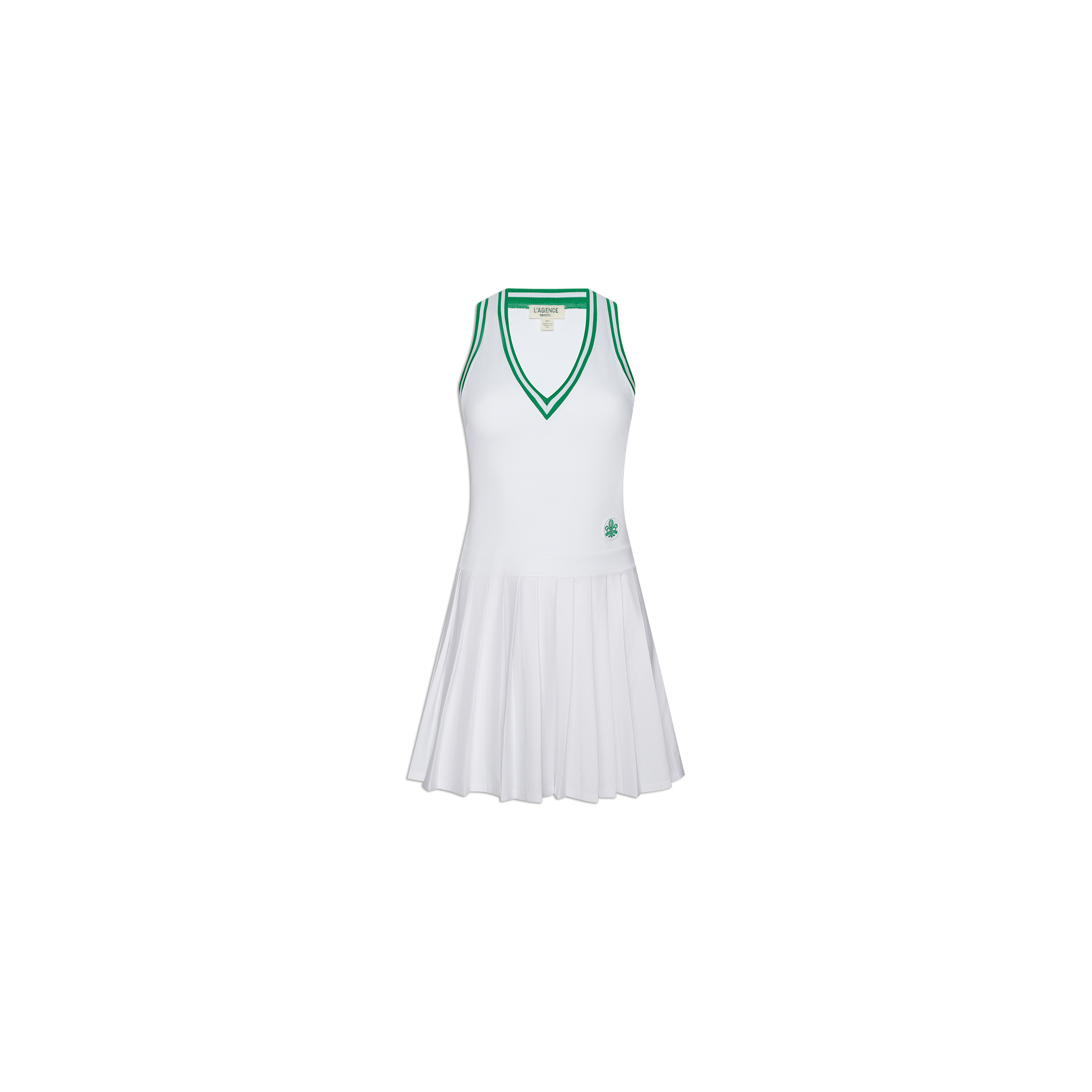 The Courtney Racerback Tennis Dress is a white sleeveless tennis dress with green trim along the V-neck and armholes. Designed from performance fabric for enhanced comfort, it features pleats on the skirt and a small emblem near the hem. The dress also includes a built-in bra and is shown against a plain white background.