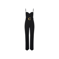 The Jessa Bustier Jumpsuit is a black sleeveless piece with thin straps, a sweetheart neckline, and a fitted bodice. It features a waist-defining belt with a large gold buckle, straight-leg pants, and is crafted from bi-stretch twill. The jumpsuit is displayed on a plain white background.