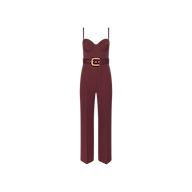 Jessa Bustier Jumpsuit in deep red, featuring a sweetheart neckline, thin shoulder straps, and a matching belt with a gold-tone buckle at the waist.