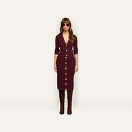 A person wearing a burgundy Irvin Pointelle Knit Cardigan and matching midi skirt with gold buttons, paired with tall brown boots and sunglasses.
