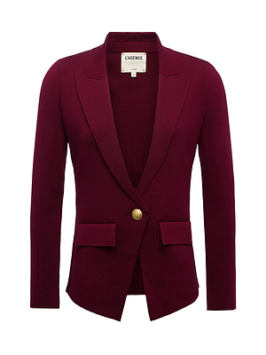 The Chamberlain Knit Blazer by L'AGENCE is maroon with a tailored fit, single gold button, notched lapels, two front flap pockets, and a chest pocket.