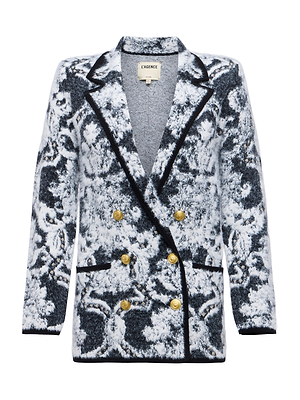 The Eileen Jacquard Knit Blazer by L'AGENCE features a black and white abstract jacquard knit, gold buttons, black-trimmed lapels, pockets and cuffs, an oversized boyfriend fit, and a branded label on the inside collar.